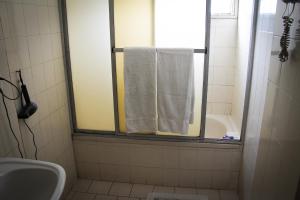 Koupelna v ubytování Hotel Menossi