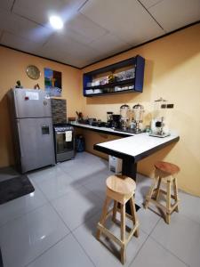 Kuchyň nebo kuchyňský kout v ubytování Toucan Hostel