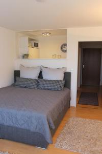 Postel nebo postele na pokoji v ubytování Rosenalm Scheidegg Apartment 256