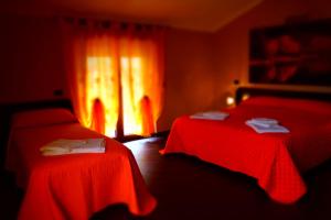 Postel nebo postele na pokoji v ubytování B&B Il Fruscio