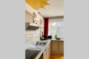 Kuchyň nebo kuchyňský kout v ubytování Apartment Linda
