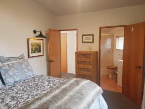 Un pat sau paturi într-o cameră la Villa 10 - Central Stylish Apartment