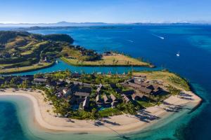 an aerial view of an island in the ocean at Six Senses Fiji in Malolo