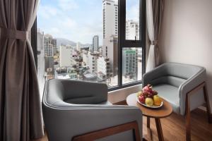 Coin salon dans l'établissement DTX Hotel Nha Trang
