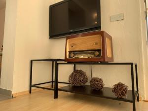TV a/nebo společenská místnost v ubytování Studio Janko by El-Pi Tours