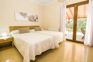 A bed or beds in a room at Finca Katia