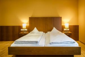 Letto o letti in una camera di Montfort - das Hotel