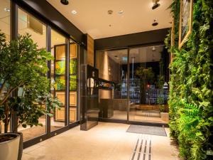 Aed väljaspool majutusasutust Super Hotel Nagaizumi Numazu Inter