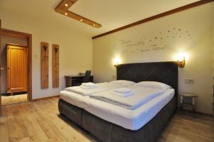 Katil atau katil-katil dalam bilik di Pension & Apartments Weissbriach