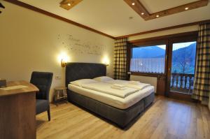 Katil atau katil-katil dalam bilik di Pension & Apartments Weissbriach