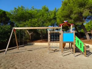 a childrens playground with a swing set at Agriturismo Il Trappeto in Gallipoli