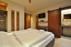 Katil atau katil-katil dalam bilik di Pension & Apartments Weissbriach