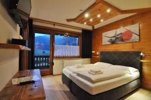 Katil atau katil-katil dalam bilik di Pension & Apartments Weissbriach