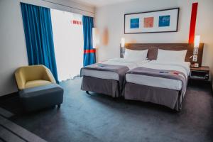 Кровать или кровати в номере Piter Inn