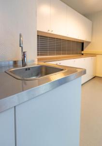 Virtuvė arba virtuvėlė apgyvendinimo įstaigoje Mosjøen Romutleie - Sentrum 3