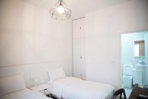 Letto o letti in una camera di Old Bazaar Rooms