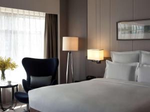Letto o letti in una camera di Pullman Shanghai Xuhui