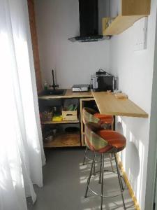 Kuchyň nebo kuchyňský kout v ubytování 13 suites
