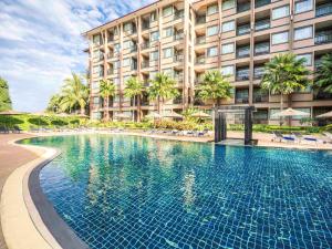 Bazén v ubytování Novotel Phuket Vintage Park Resort nebo v jeho okolí