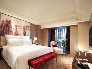 Llit o llits en una habitació de Pullman Xiamen Powerlong