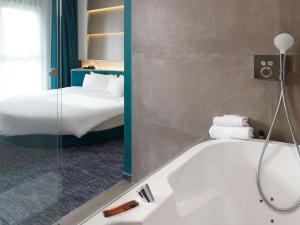 Vannituba majutusasutuses Ibis Styles Nivelles