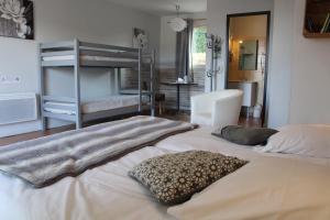 Postel nebo postele na pokoji v ubytování Hotel La Peyrade