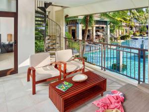 A view of the pool at Pullman Port Douglas Sea Temple Resort and Spa or nearby 