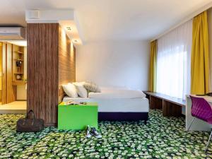 Voodi või voodid majutusasutuse Ibis Styles Wien City toas