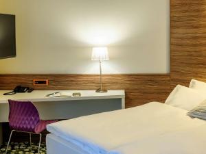 Televiisor ja/või meelelahutuskeskus majutusasutuses Ibis Styles Wien City