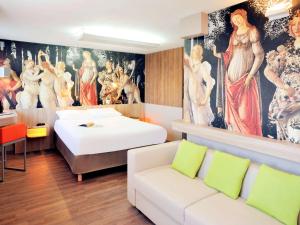 Postel nebo postele na pokoji v ubytování Ibis Styles Lille Marcq En Baroeul