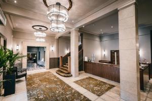 a lobby of a hotel with a reception area at The Station Hotel in Aberdeen