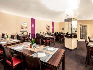 Um restaurante ou outro lugar para comer em Mercure Frankfurt City Messe