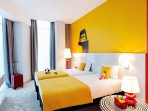 Postel nebo postele na pokoji v ubytování Ibis Styles Wroclaw Centrum