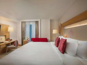 Postelja oz. postelje v sobi nastanitve Novotel Yangon Max