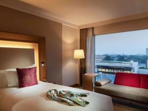 Postelja oz. postelje v sobi nastanitve Novotel Yangon Max