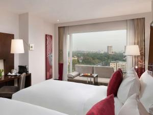 Postelja oz. postelje v sobi nastanitve Novotel Yangon Max