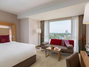 Postelja oz. postelje v sobi nastanitve Novotel Yangon Max