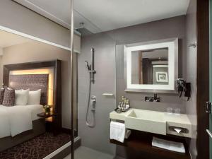 Postelja oz. postelje v sobi nastanitve Novotel Yangon Max