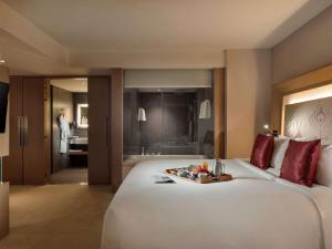 Postelja oz. postelje v sobi nastanitve Novotel Yangon Max