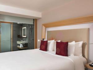 Postelja oz. postelje v sobi nastanitve Novotel Yangon Max