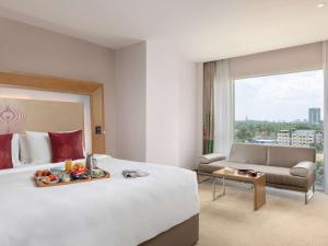 Postelja oz. postelje v sobi nastanitve Novotel Yangon Max