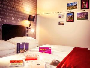 Postel nebo postele na pokoji v ubytování Mercure Vienna First