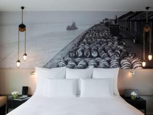 מיטה או מיטות בחדר ב-Pullman Liverpool
