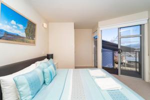 Ένα ή περισσότερα κρεβάτια σε δωμάτιο στο Launceston Views Townhouses
