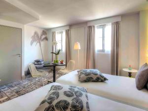 Llit o llits en una habitació de Ibis Styles Nice Centre Gare