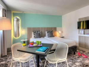 Llit o llits en una habitació de Ibis Styles Nice Centre Gare