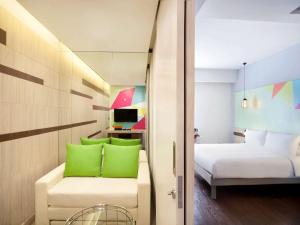 Voodi või voodid majutusasutuse Ibis Styles Jakarta Sunter toas
