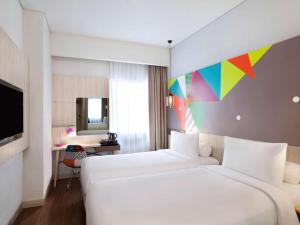 Voodi või voodid majutusasutuse Ibis Styles Jakarta Sunter toas