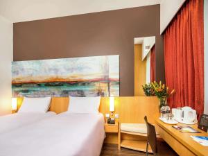 Voodi või voodid majutusasutuse Ibis One Central - World Trade Centre Dubai toas