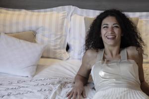 A bed or beds in a room at Hotel Crystal